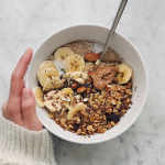 Oatmeal with fruit, granola and nuts